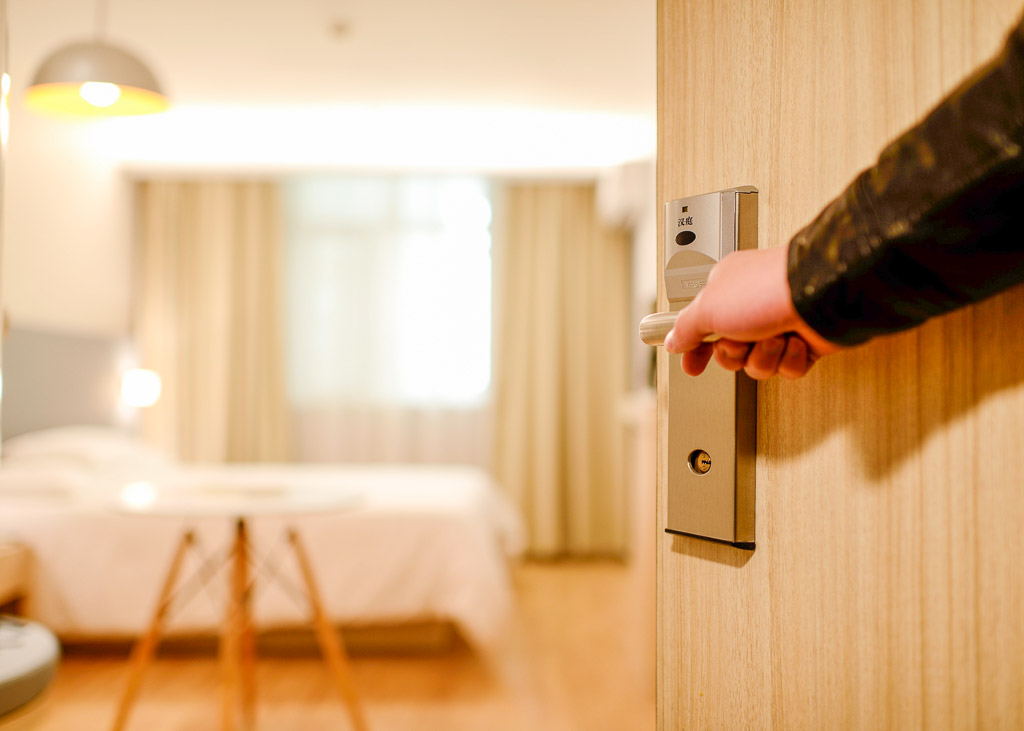 door opening to hotel room