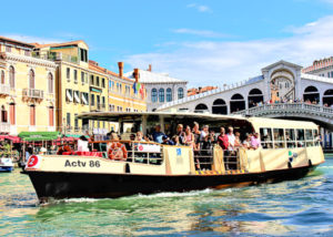 Vaporetto with Rialto Bridge in the background